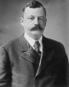 A black and white photographic portrait of Boies Penrose.